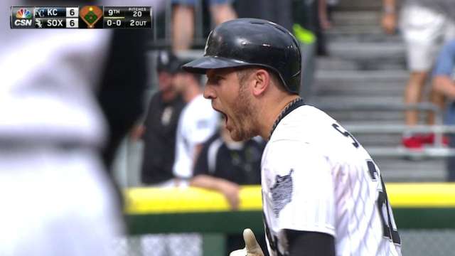 Chicago's Mark Buehrle celebrates with catcher Chris Widger after