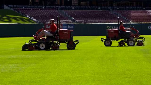 Busch Stadium grounds crew cuts patterns into grass in St. Louis